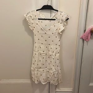 White dress with gold polka dots